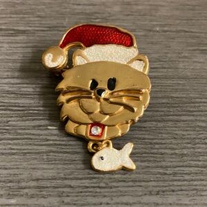 Festive Gold Cat Brooch with Red Santa Hat